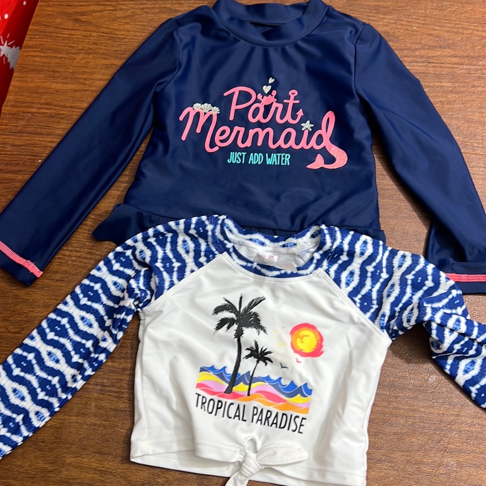 Two rash guard swim shirts